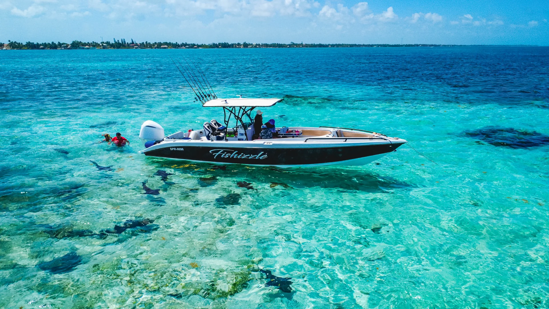 Fishizzle anchored in the turquoise shallows