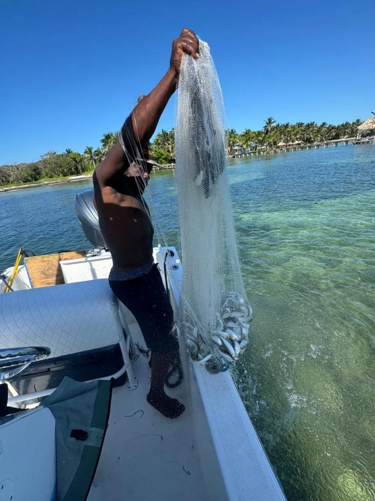 A guest holding the day’s catch