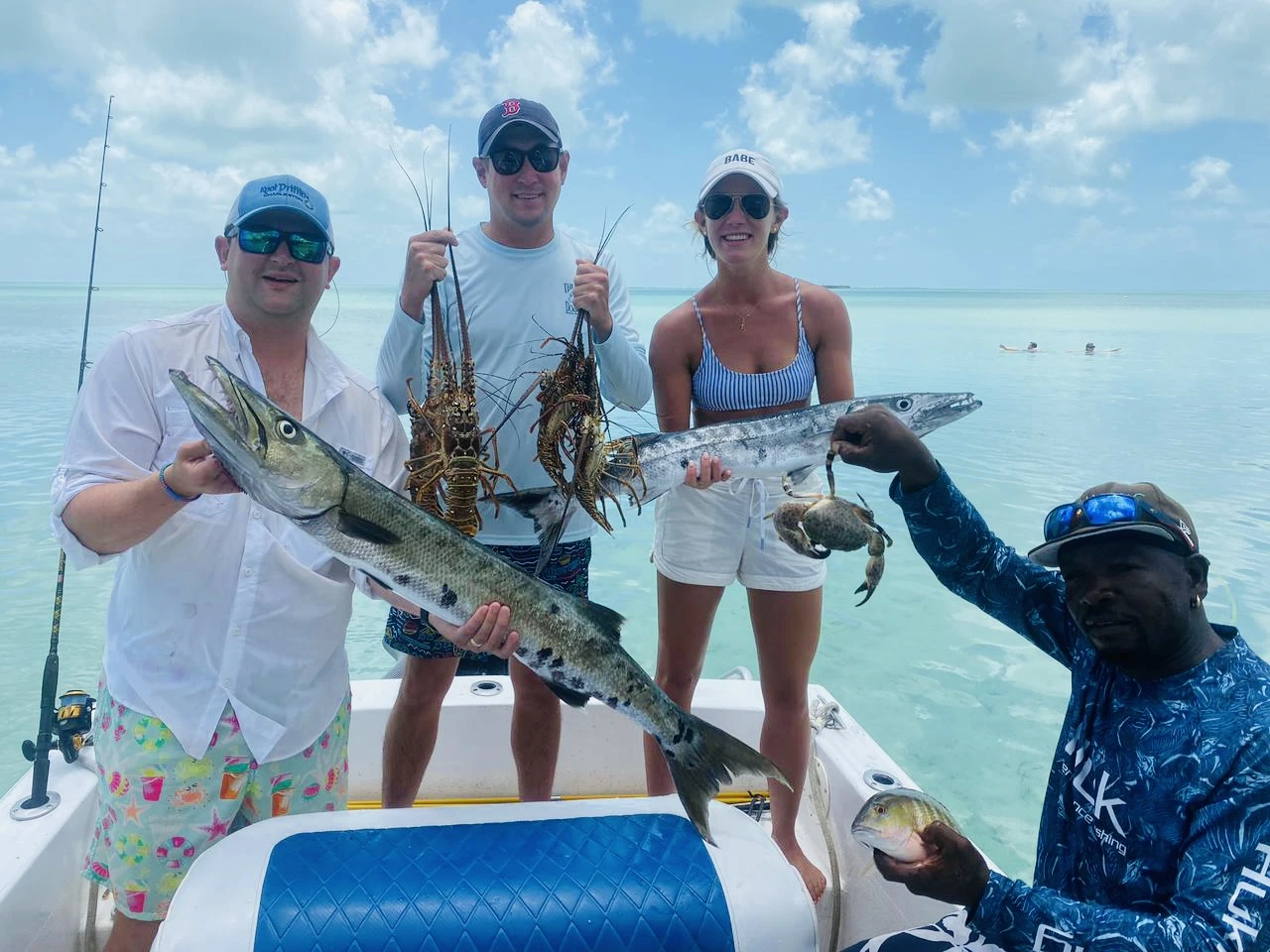 Guests celebrating their catch with Seakarus